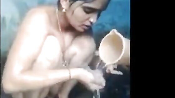 Indian milf bathing and showing her beautiful pussy