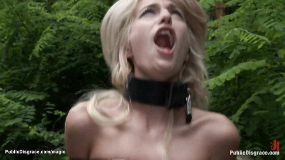 Strapped blonde fucked in the woods