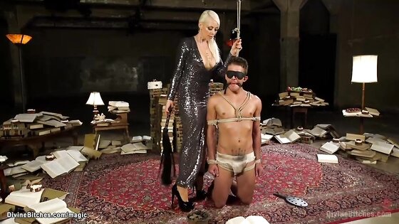 Blonde femdom in night dress whip man