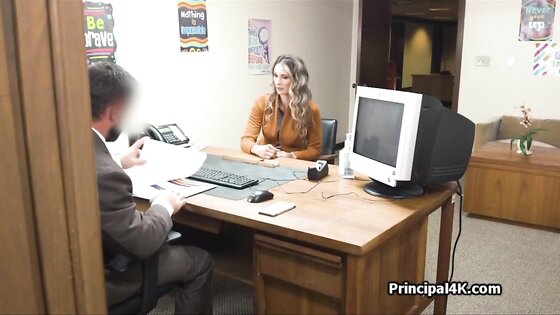 Busty housewife gags on principals dick at office