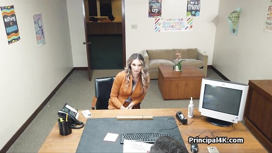 Busty housewife gags on principals dick at office