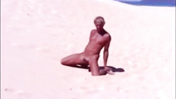 Tanned guy on beach in tiny string thong (temporarily!)