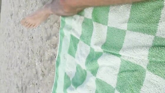 Gay wanks his huge dick and cums at the beach in public