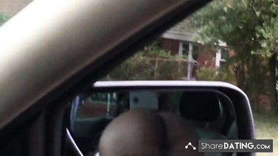 Black slut sucking dick in front seat of car