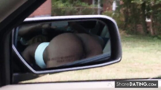 Black slut sucking dick in front seat of car