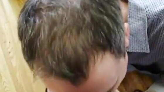 Amateur Takes On Two in a Group Blowjob