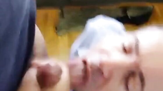 Amateur Takes On Two in a Group Blowjob