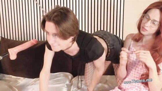 Two Naughty Traps Take Turns Pounding Each Other’s Ass