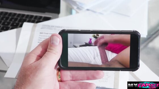 Giving my stepdad a footjob while stepmom is out