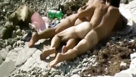 Auntie pleased by a local lover on beach (voyeur)