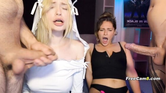 Two Slutty Babes Sucking Cock Side by Side