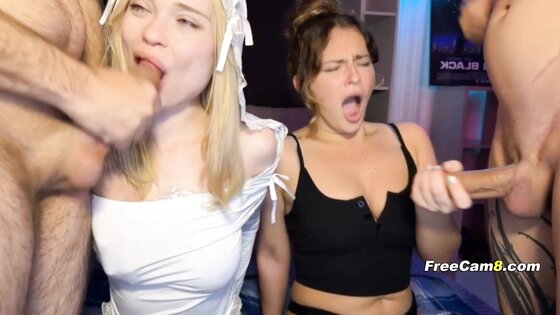 Two Slutty Babes Sucking Cock Side by Side