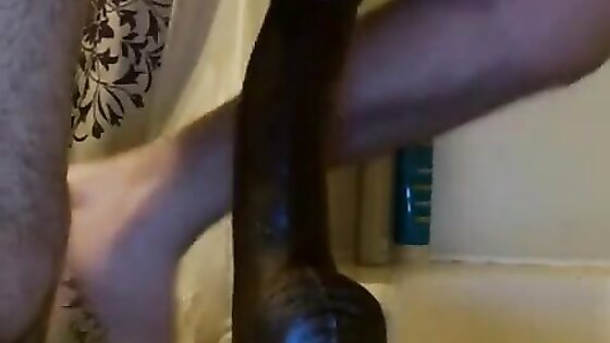 Sissy twink takes massive black dildo.