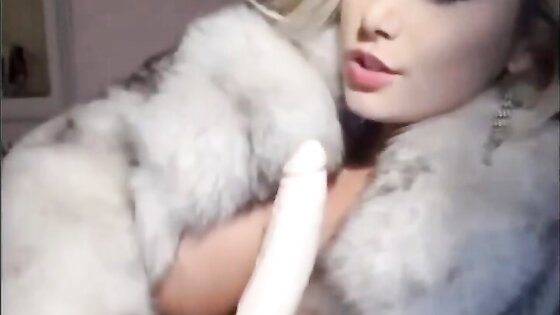 Trisha Annabelle smoking on webcam fur coat