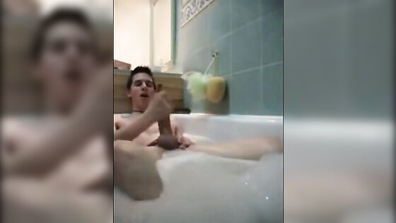 Twink jerking off in bathtub