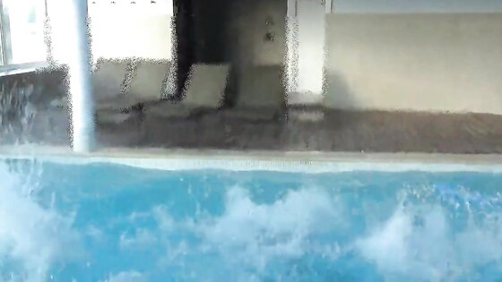 Four men at swimming pool