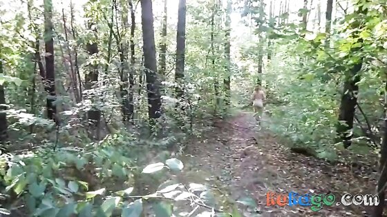 chubby girl with big booty walking nude in forest