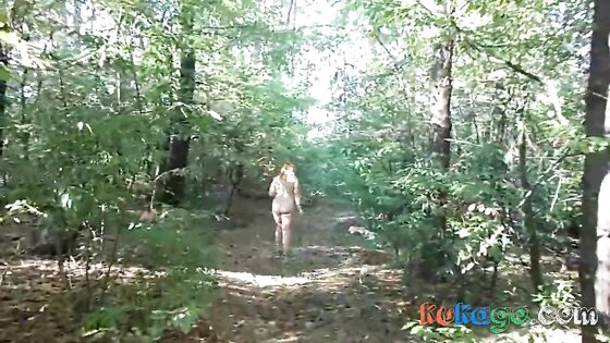 chubby girl with big booty walking nude in forest