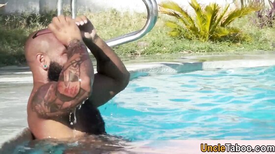 Muscle hunk pleasing big dick bareback at the poolside