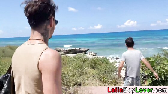 Latin guys celebrate gay pride on the beach outdoor