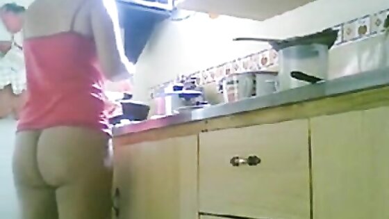 LATINA MATURE NUDE KITCHEN